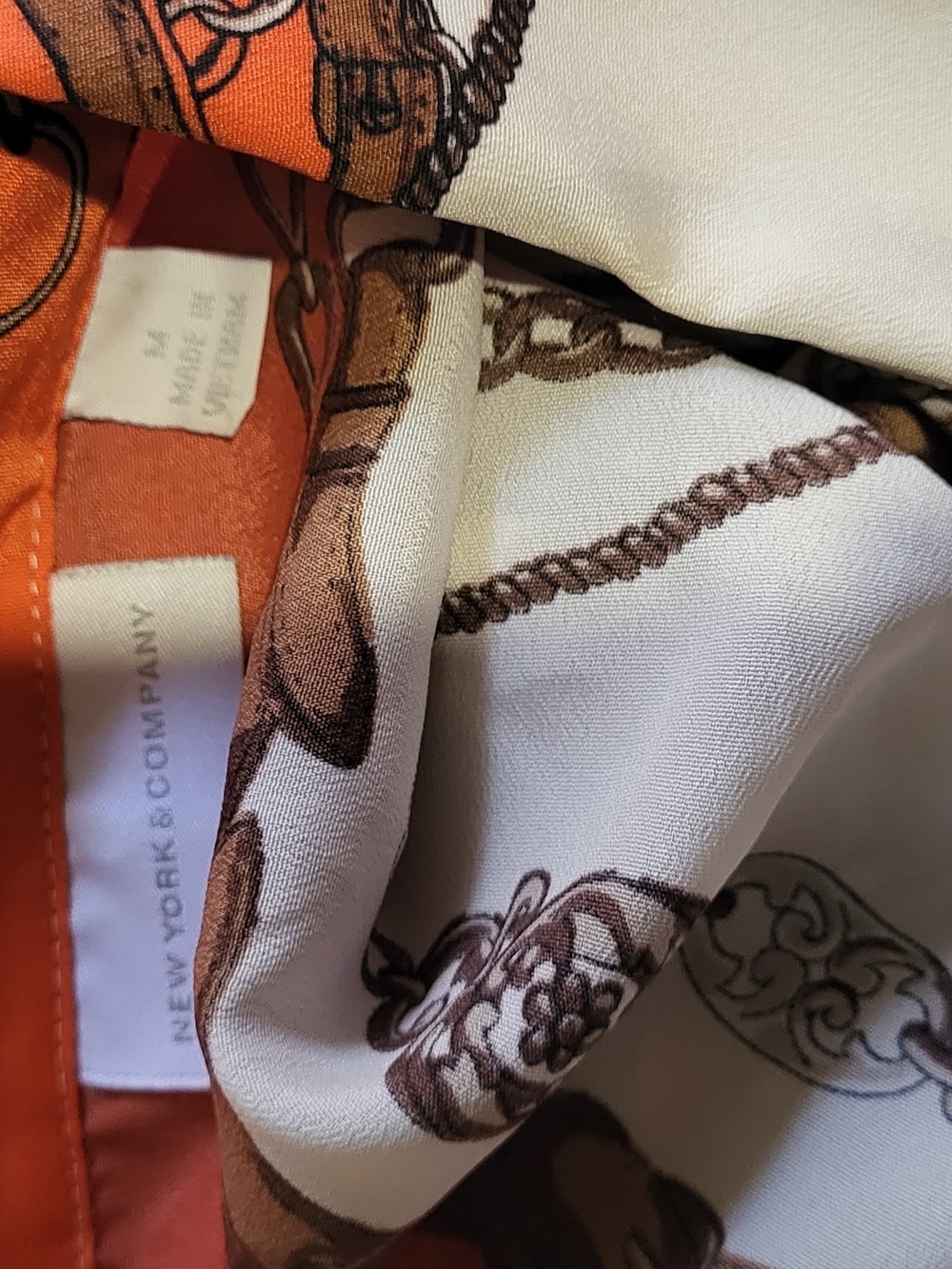 New York & Company Orange and Cream Chain Print Scarf